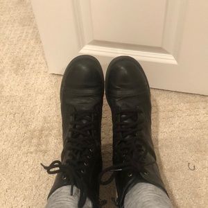 Used black combat boots.